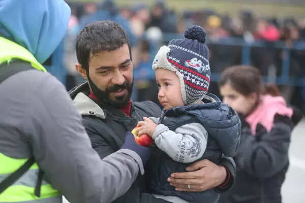 These pictures of migrants braving cold at Poland-Belarus border will melt your heart