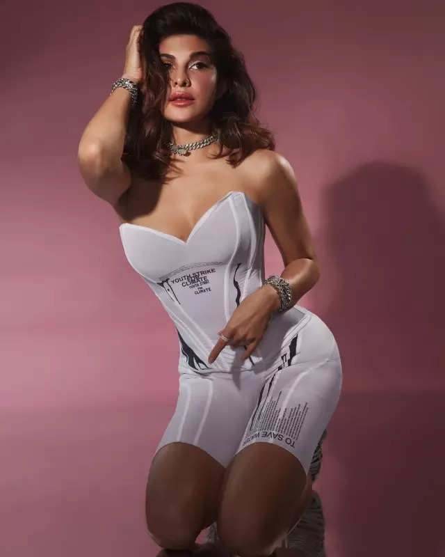  raises the style bar in pristine white corset top and biker shorts, pictures will leave you awestruck!