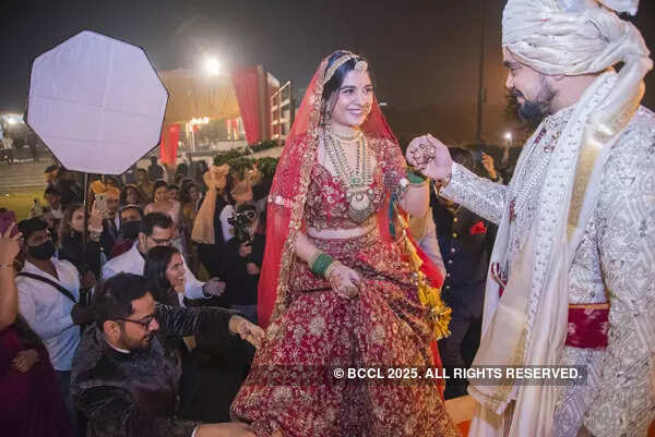 Candid pictures from actress Anshul Chauhan and Ateet Singh's star-studded wedding festivities