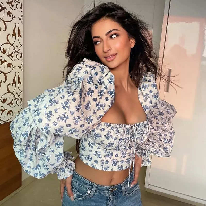 Palak Tiwari shares sun-kissed pictures in purple crop top and printed pants