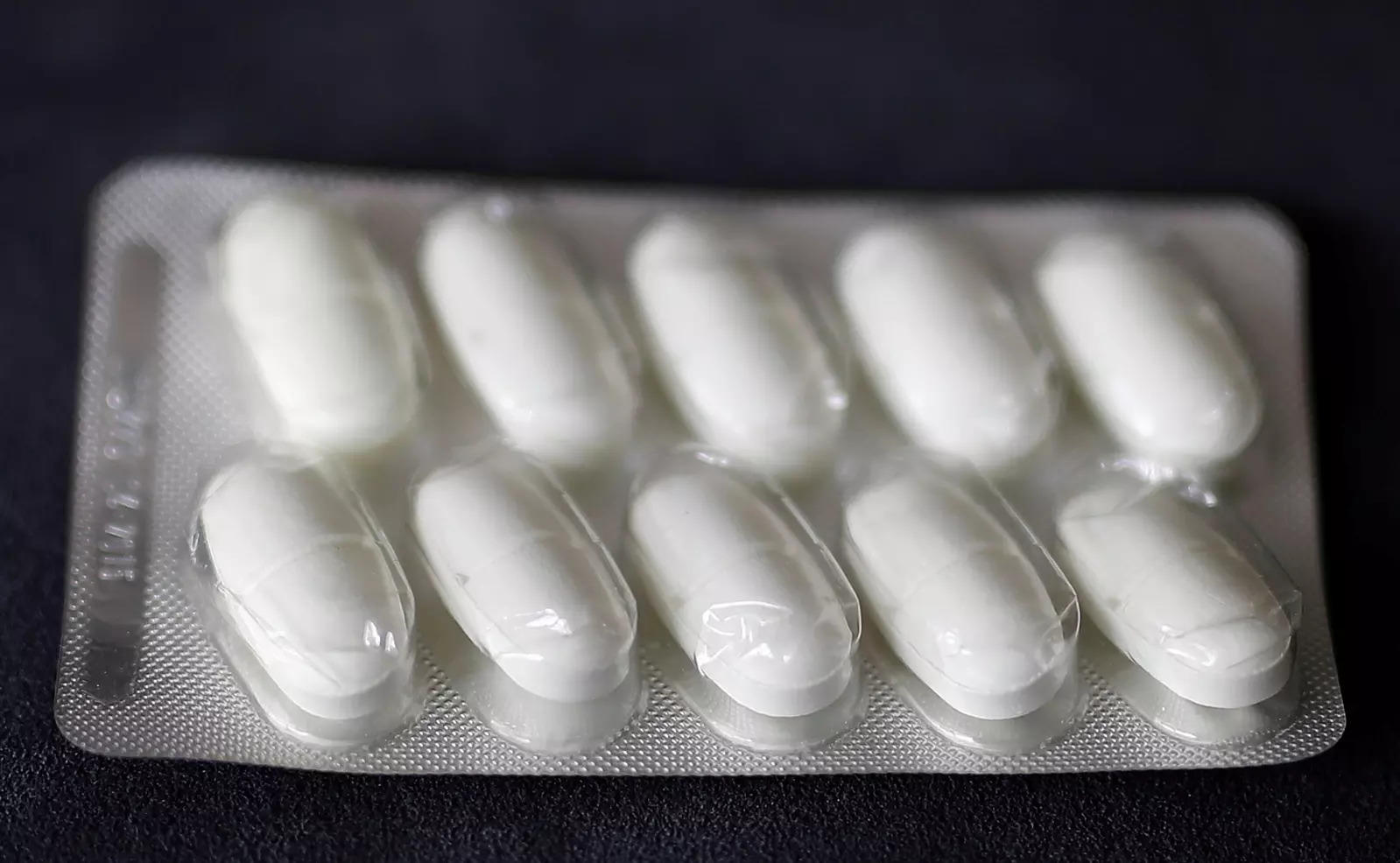 FILE PHOTO: Ten pills of the antibiotic "Amoxicillin 1000mg" are seen at a pharmacy in Hanau