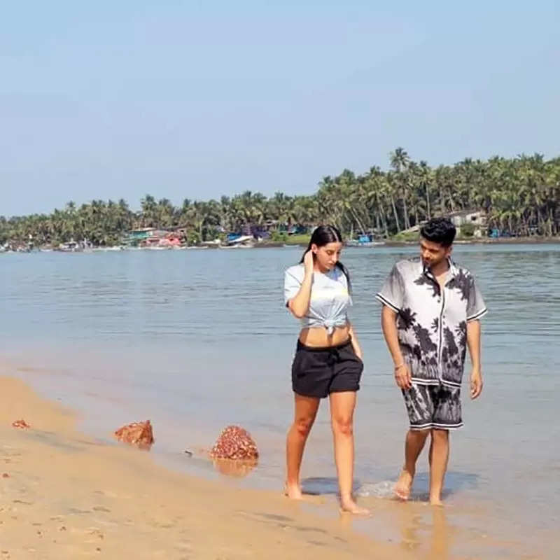 These viral pictures of Nora Fatehi and Guru Randhawa enjoying beach walk spark dating rumours