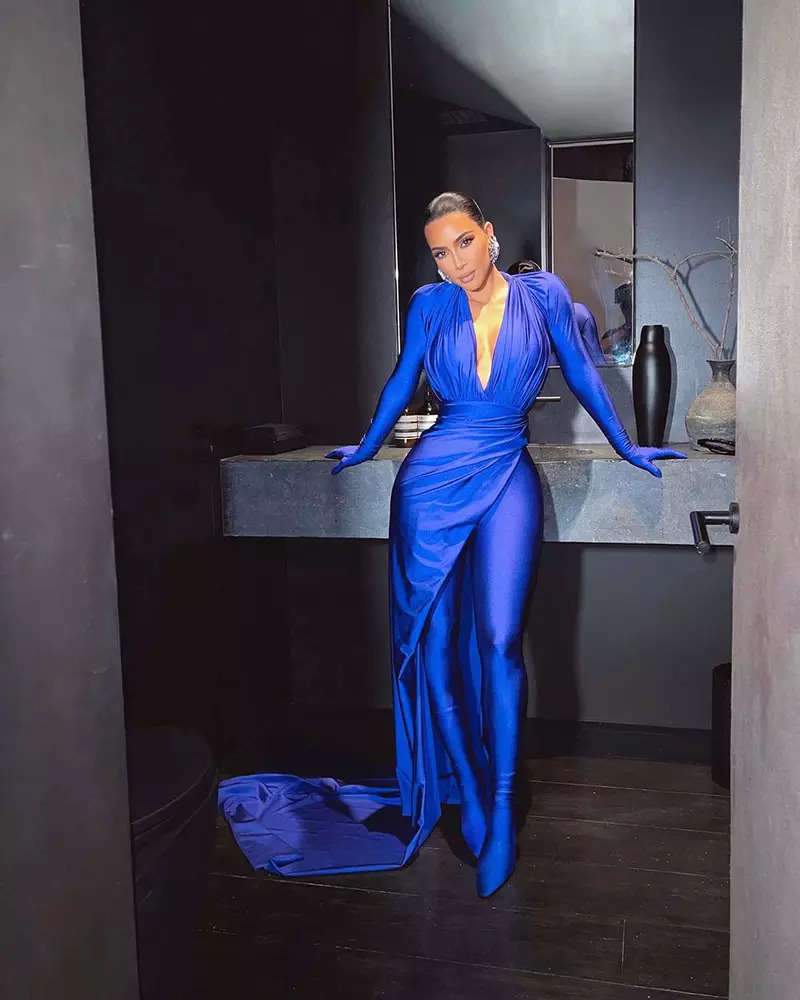 Kim Kardashian wows in bright blue catsuit with a plunging neckline in her new captivating photoshoot