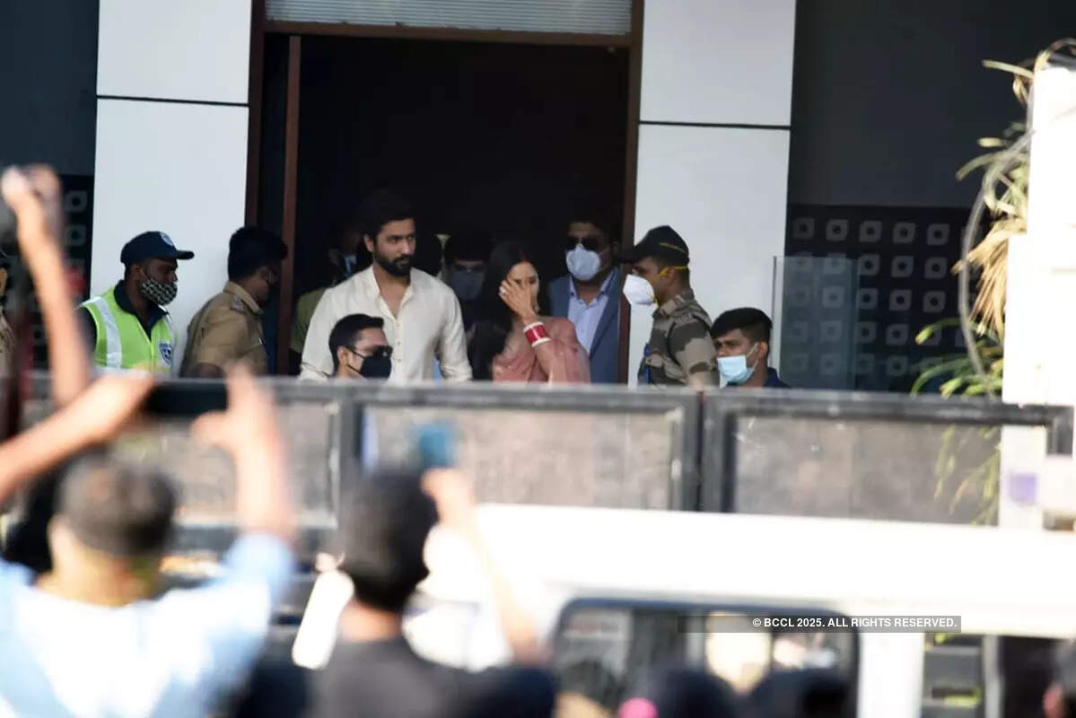 These smiling pictures of newlyweds Vicky Kaushal and Katrina Kaif walking hand-in-hand at Mumbai airport go viral