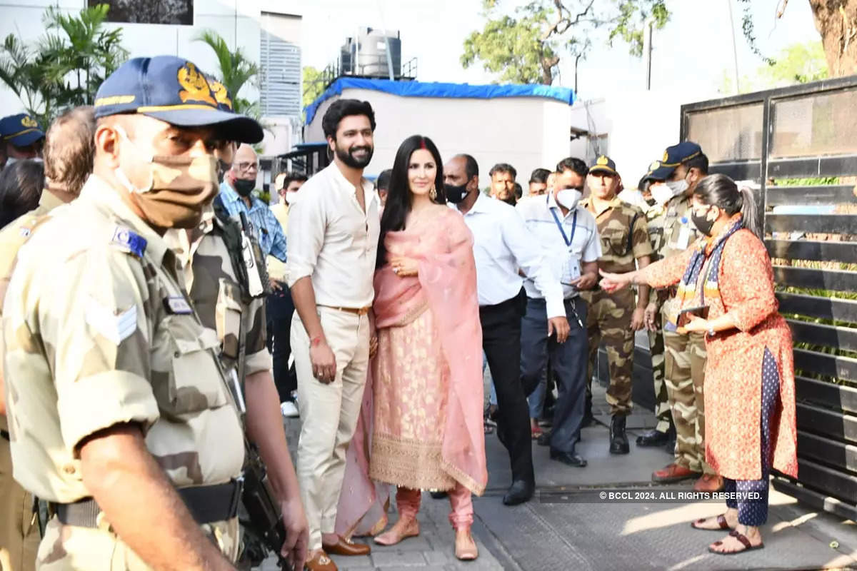 These smiling pictures of newlyweds Vicky Kaushal and Katrina Kaif walking hand-in-hand at Mumbai airport go viral