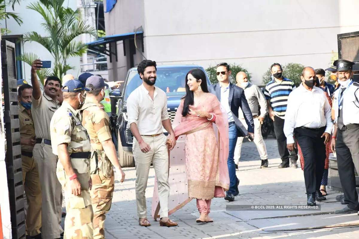 These smiling pictures of newlyweds Vicky Kaushal and Katrina Kaif walking hand-in-hand at Mumbai airport go viral