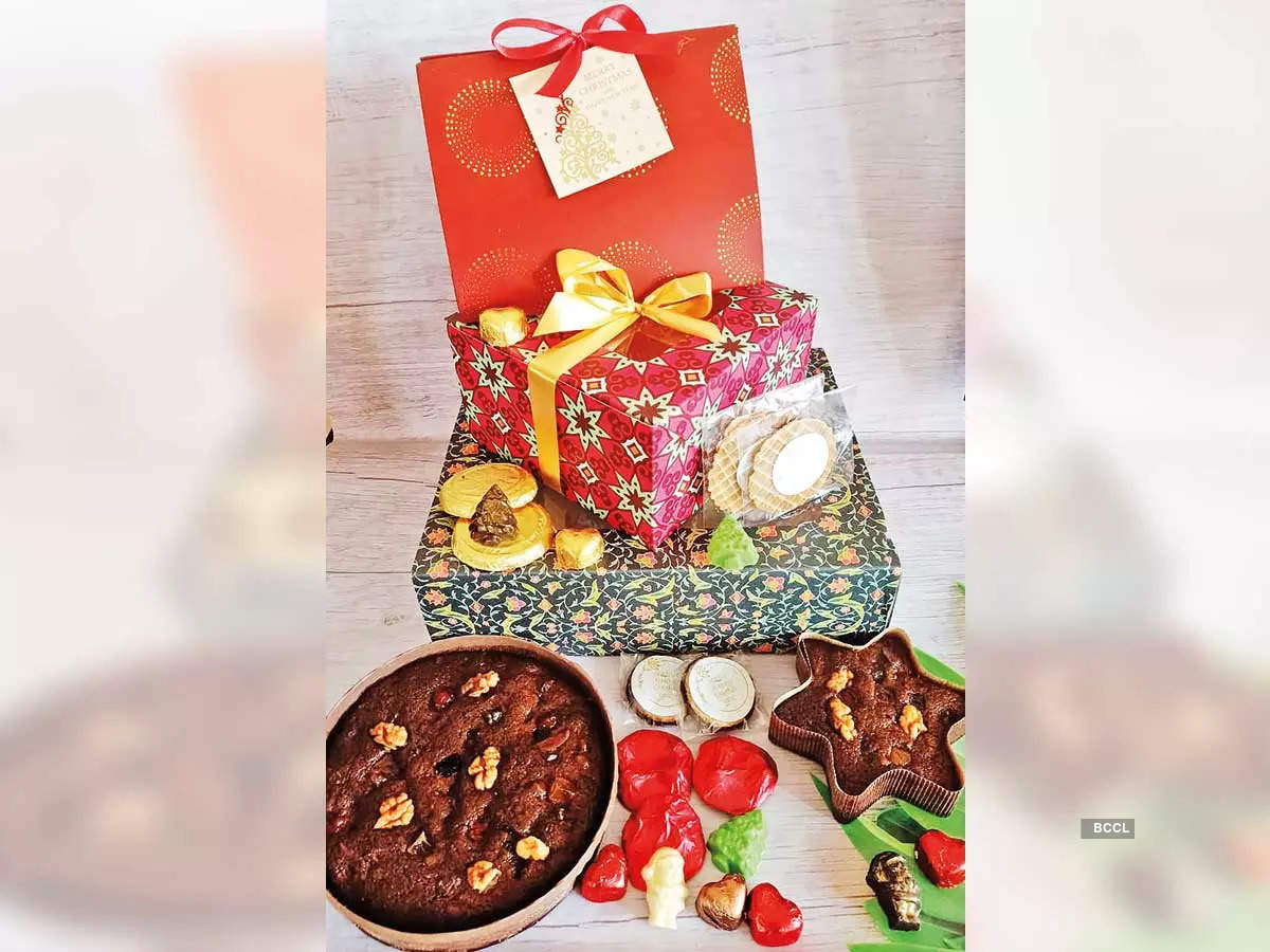Christmas display with plum cake and chocolate waffles