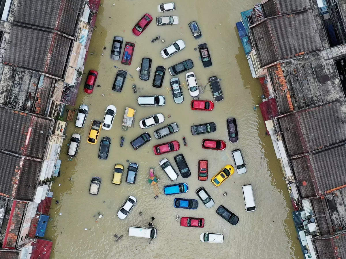 Typhoon Rai in Philippines, floods in Malaysia leave over 400 dead; see pics