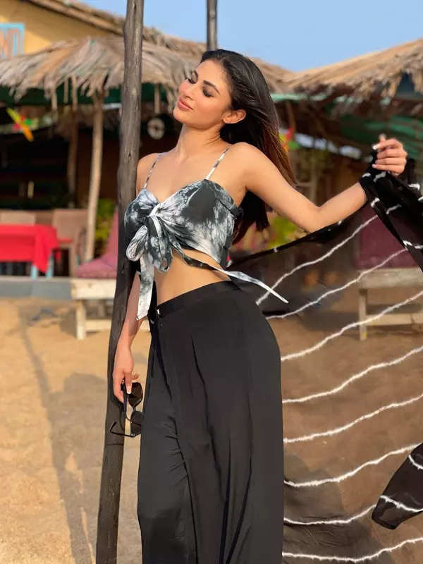 Netizens go gaga as Mouni Roy shares breathtaking sun-soaked pictures from the beach