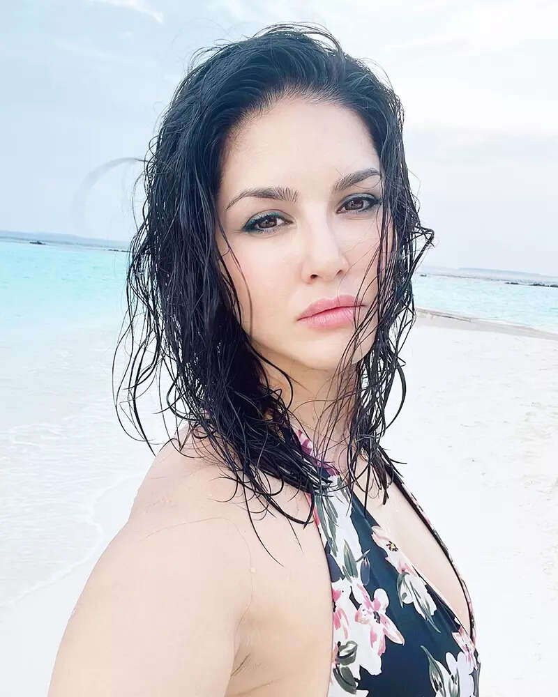Sunny Leone radiates a pop of freshness with her glamorous pictures in a fringe swimsuit