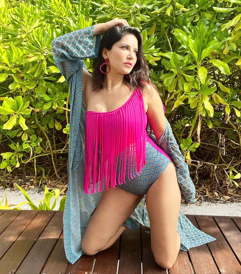 Sunny Leone radiates a pop of freshness with her glamorous pictures in a fringe swimsuit
