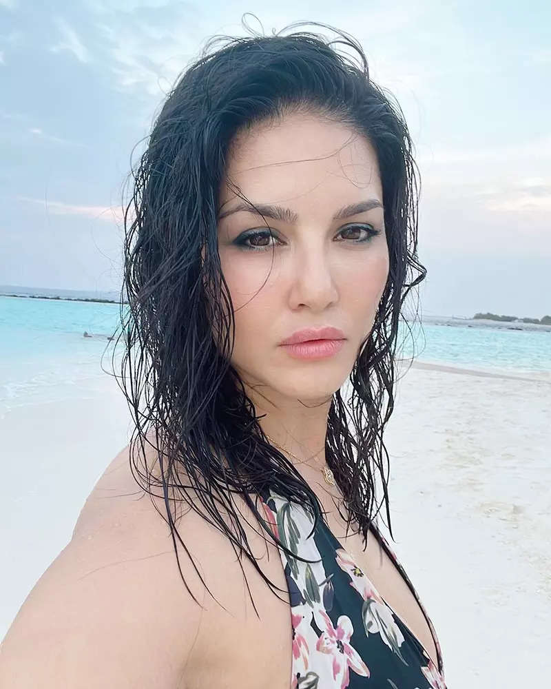 Sunny Leone radiates a pop of freshness with her glamorous pictures in a fringe swimsuit