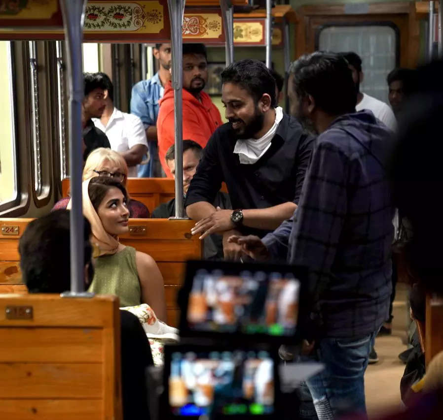 Director of Pooja Hegde starrer 'Radhe Shyam' shares BTS pics from the sets, creates a virtual storm