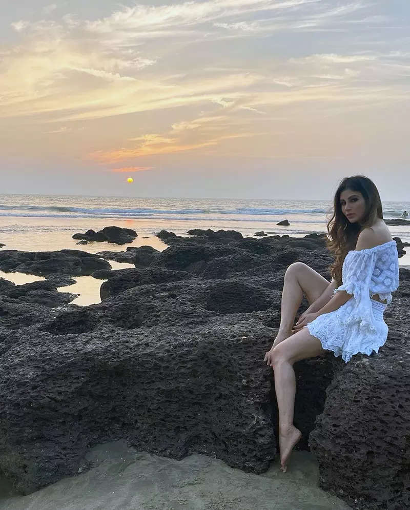 These breathtaking pictures of Mouni Roy in an off-shoulder crop top and short skirt will make you crave for seaside vacation