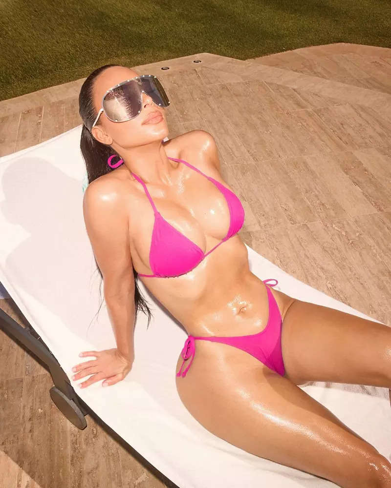 These new pictures of  soaking up the sun in a hot pink bikini will make you go WOW