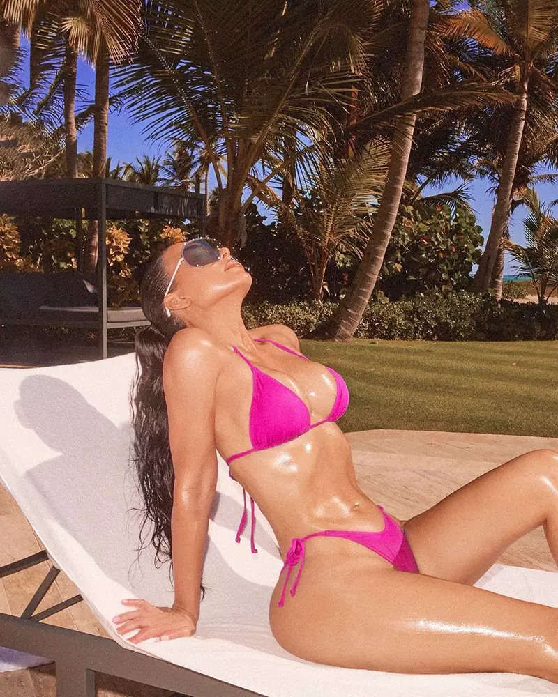 These new pictures of  soaking up the sun in a hot pink bikini will make you go WOW