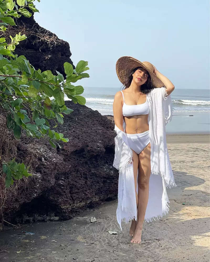 These stylish pictures of Neha Sharma in a white bikini prove she is the ultimate beach babe