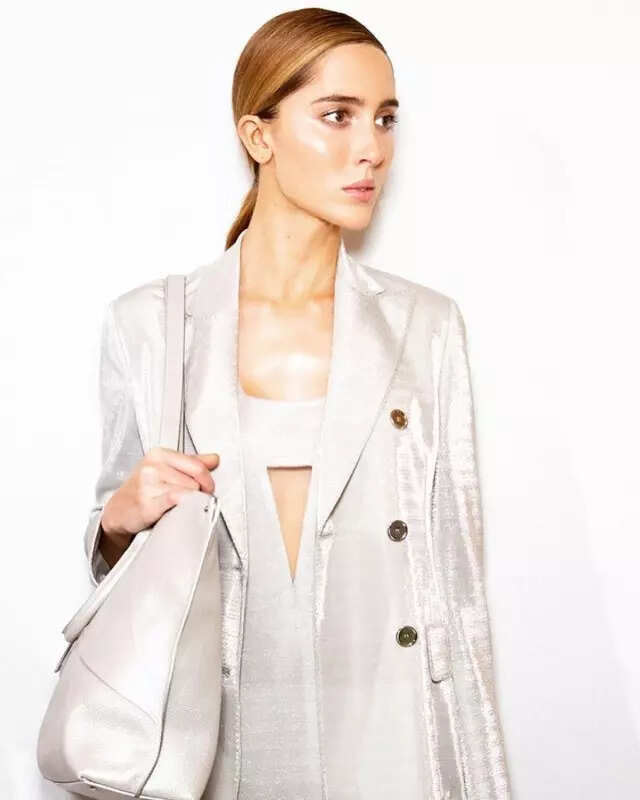 In photos: Meet Theodora 'Teddy' Quinlivan, model who was captured hitting audience member with her coat during show