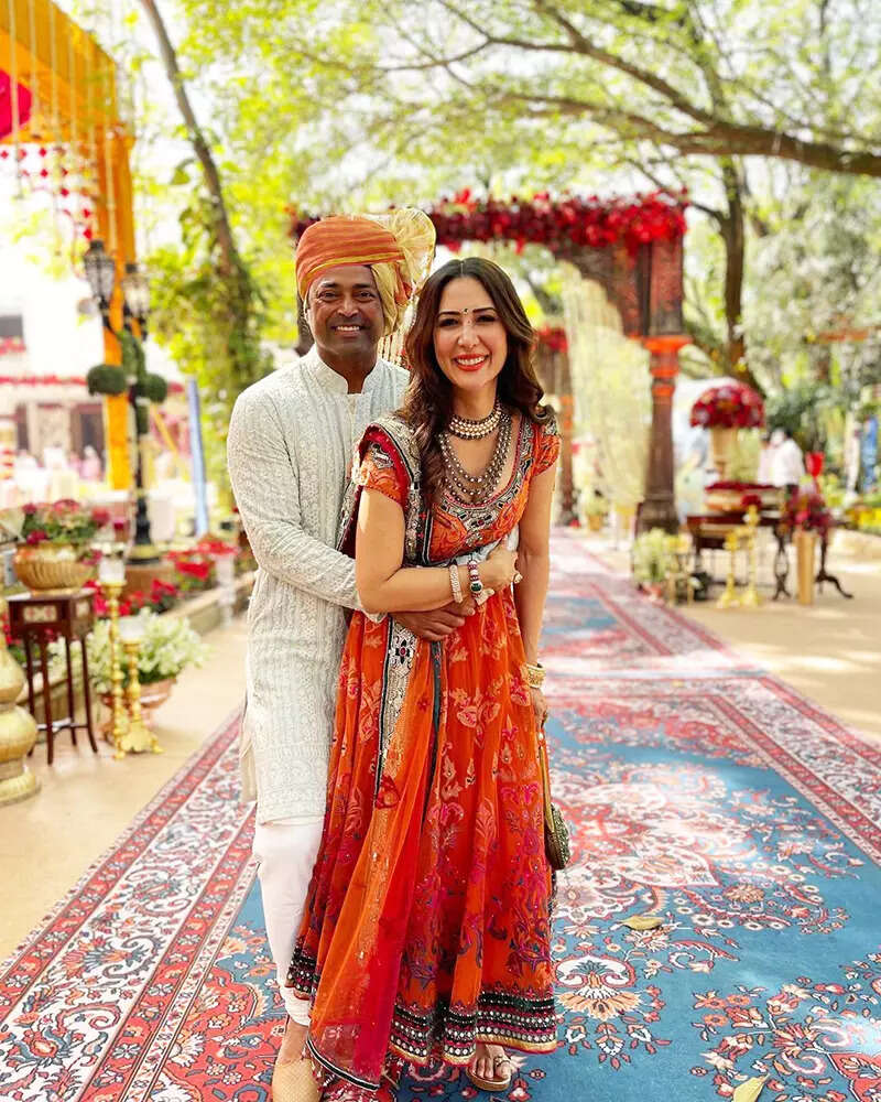 These mushy pictures of Kim Sharma and Leander Paes from a wedding scream love