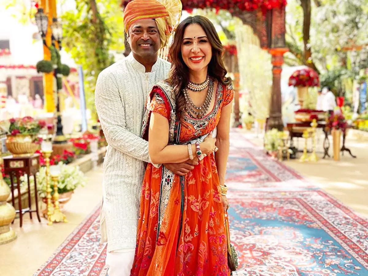 These mushy pictures of Kim Sharma and Leander Paes from a wedding scream love