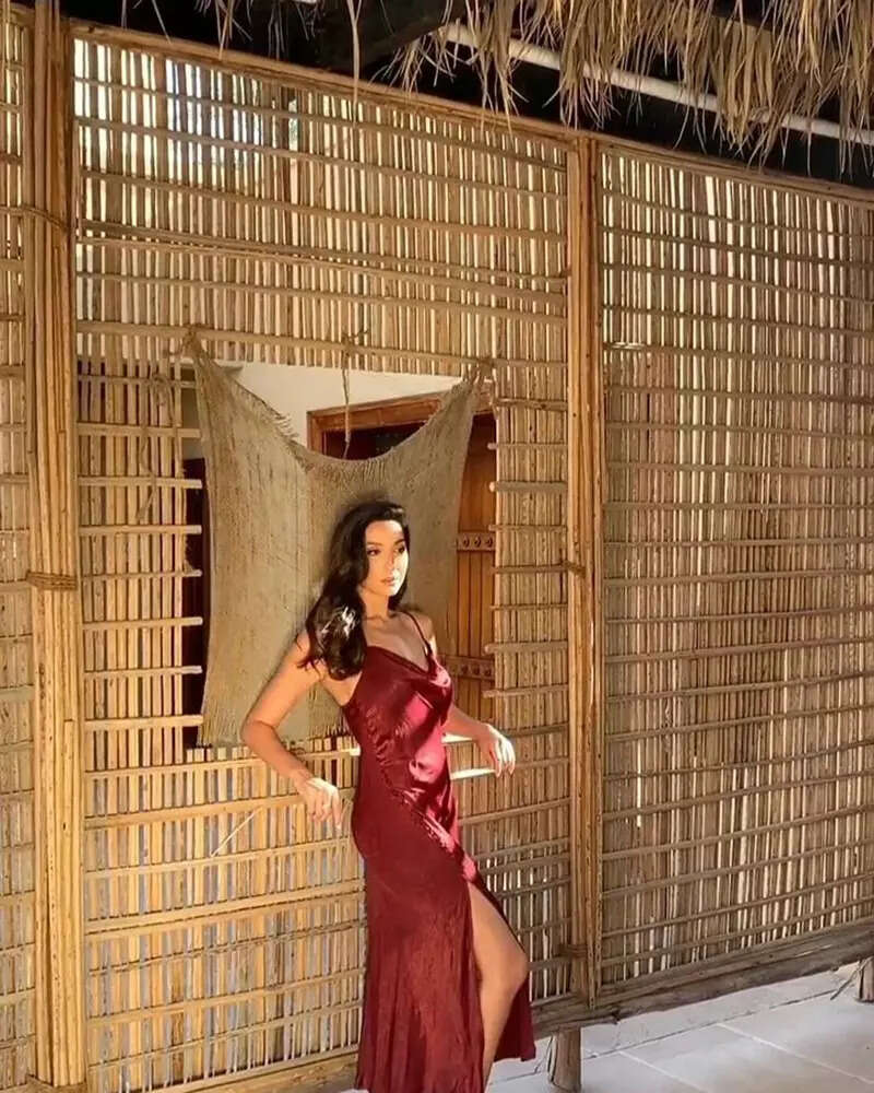 Nora Fatehi sets hearts racing with her captivating pictures in thigh-high slit strappy dress