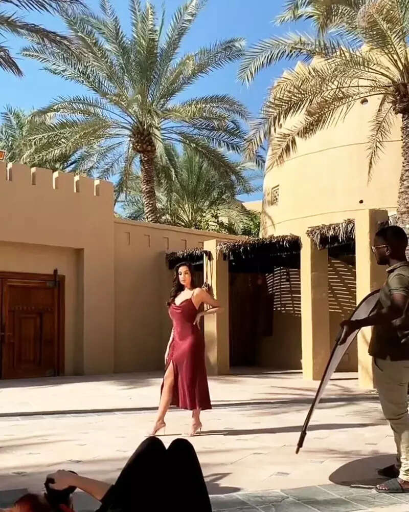 Nora Fatehi sets hearts racing with her captivating pictures in thigh-high slit strappy dress