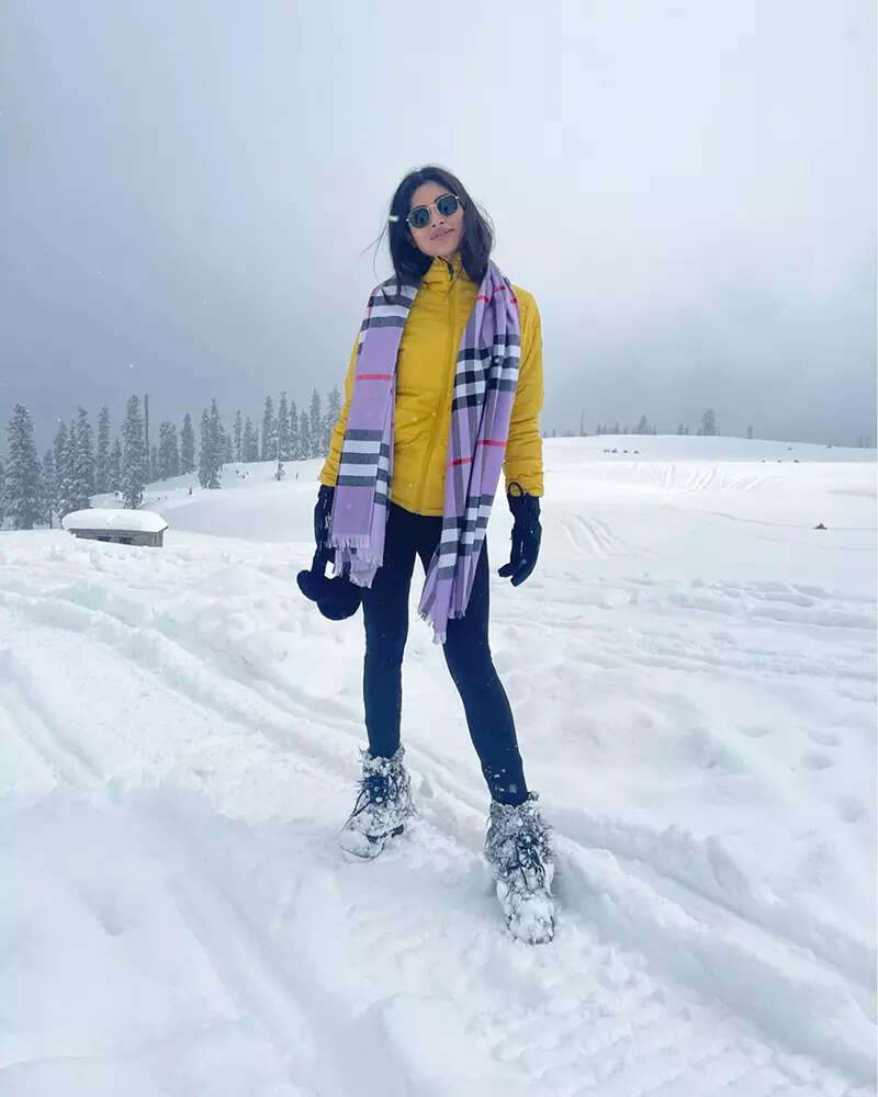 These fun-filled pictures of new bride Mouni Roy enjoying snow with hubby Suraj Nambiar will leave you asking for more