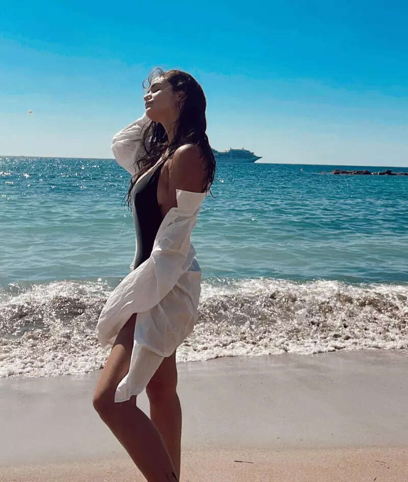 Gabriella Demetriades bids goodbye to her beach holiday in bandeau and wrap skirt