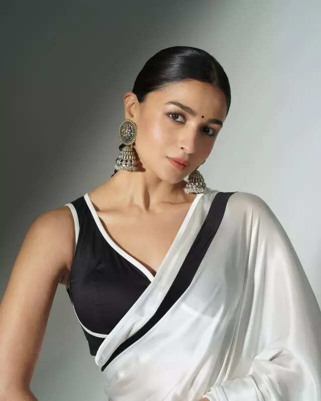 Alia Bhatt shows off her love for elegant white sarees in these stunning pictures