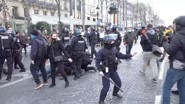 Police fire tear gas at Paris 'Freedom Convoy'; see pics