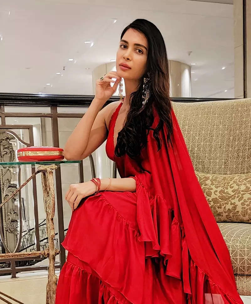 Former Miss India Ankita Shorey Looks Radiant In A Red Ruffled Saree In 