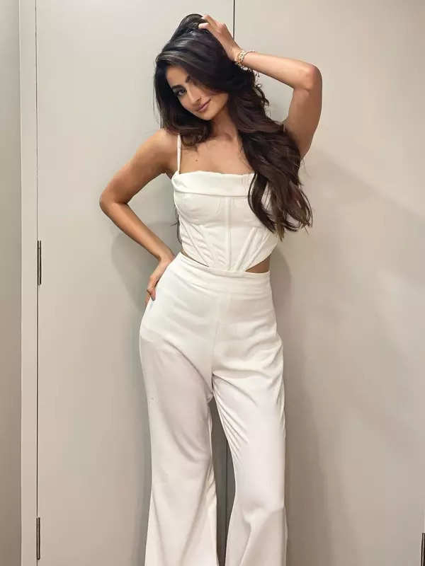 Palak Tiwari shares sun-kissed pictures in purple crop top and printed pants