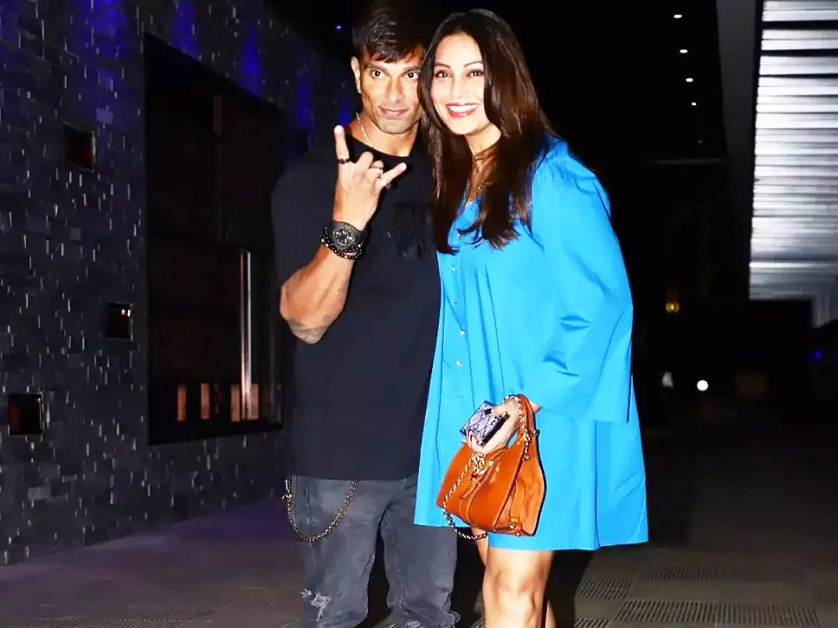 New pictures of Bipasha Basu in an oversized blue shirt dress from her dinner date with Karan Singh Grover spark pregnancy rumours
