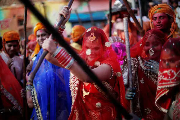 35 images from Lathmar Holi celebrations in India