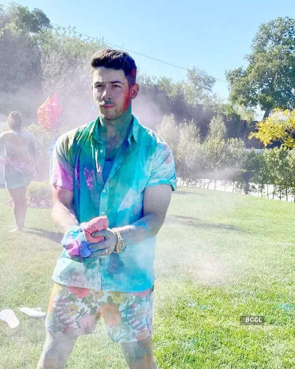 From kissing to playing with colour, Priyanka Chopra and Nick Jonas share joyful pictures from their Holi celebration
