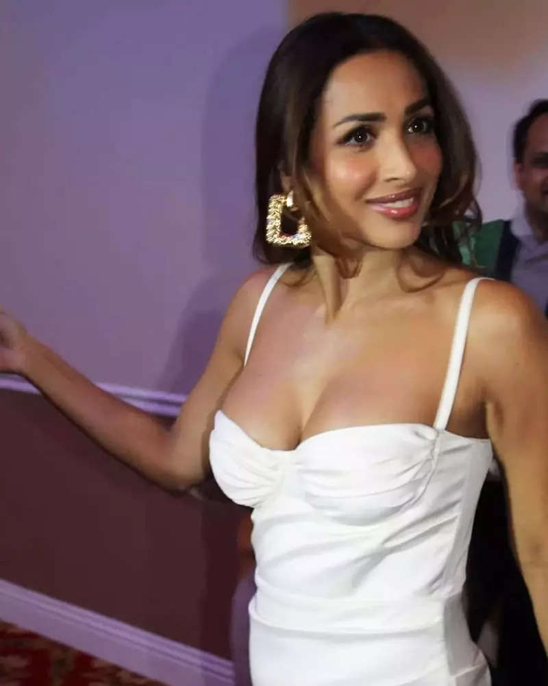 Malaika Arora sets hearts racing with her new mirror selfies in satin slip thigh-high dress