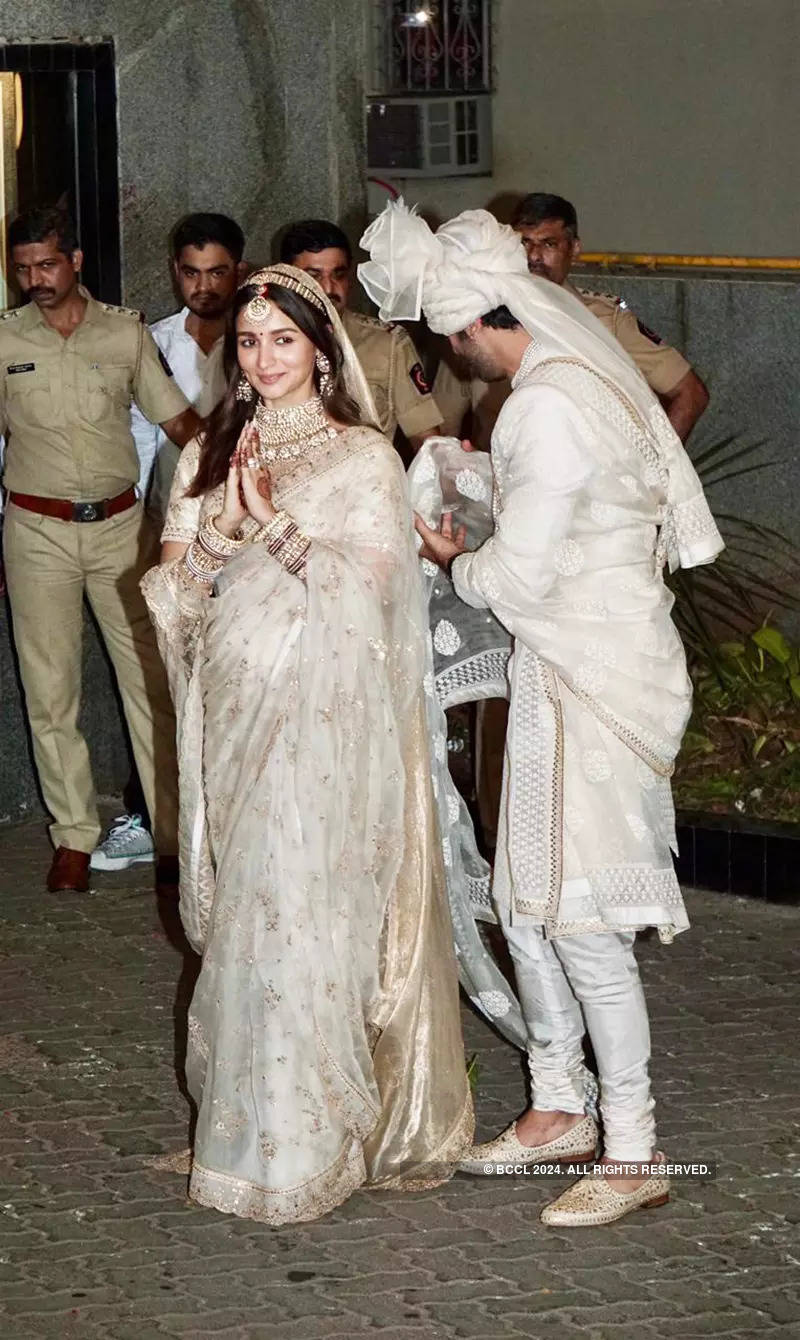 Flaunting her diamond ring, Alia Bhatt is a vision to behold in these new wedding pictures