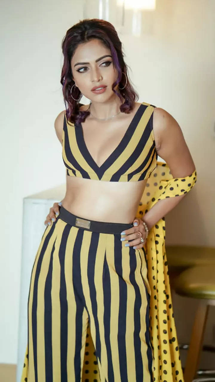 ​10 times Amala Paul managed to look exceptional in yellow outfits