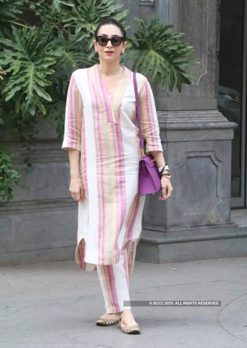 Sisters Kareena & Karisma Kapoor turn heads as they step out in style to celebrate mother Babita Kapoor's birthday