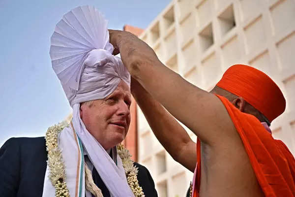 From Sabarmati Ashram, Akshardham Temple to JCB plant; these pictures capture UK PM Boris Johnson's ongoing India visit
