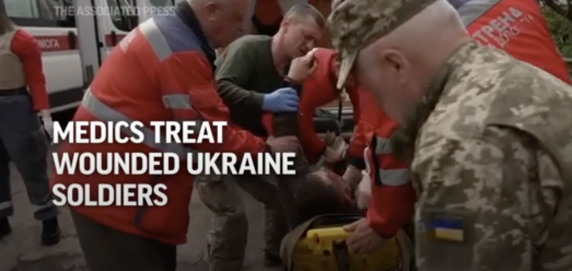 Medics treat wounded Ukraine soldiers