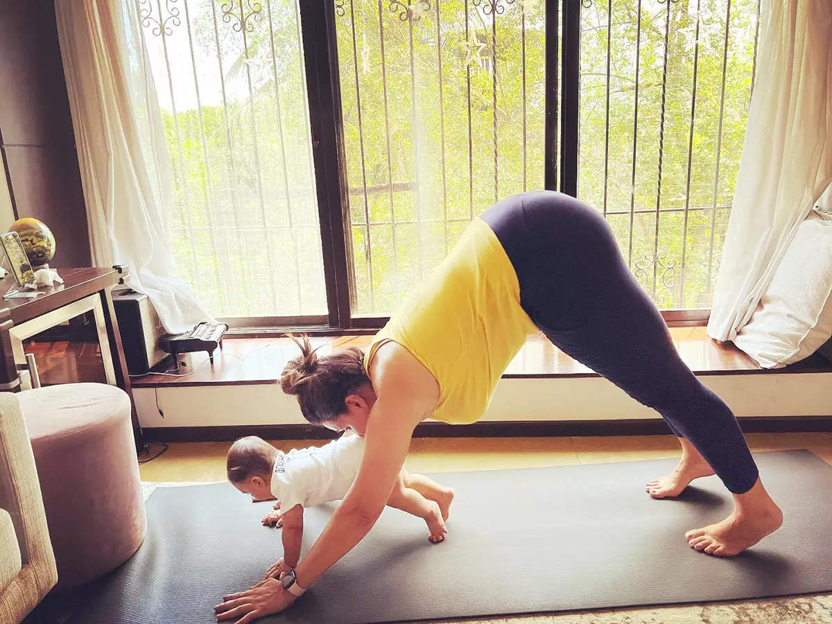 New pictures of Neha Dhupia from her morning yoga session with little son Guriq are too cute to miss