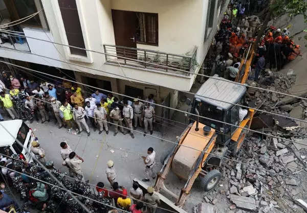 Two killed as under-construction building collapses in Delhi; see pics