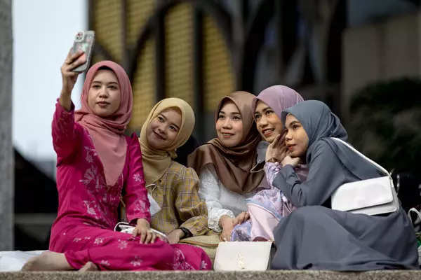 Muslims celebrate Eid al-Fitr with fervour; see pics