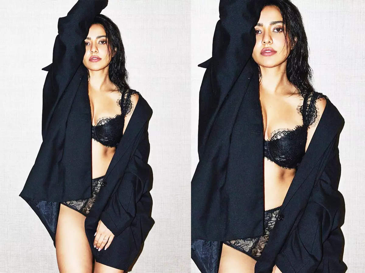 Neha Sharma sets hearts racing with her new pictures in black bralette with unbuttoned shirt