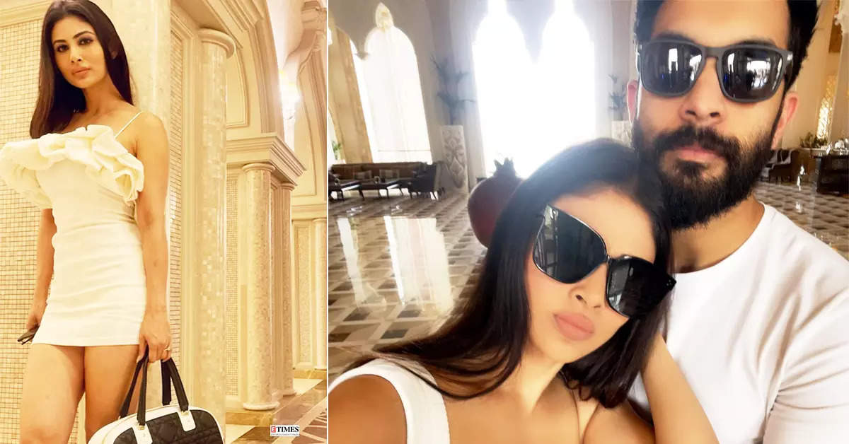 Mouni Roy turns heads in a mini dress, twins in white with hubby in these happy pictures from Doha