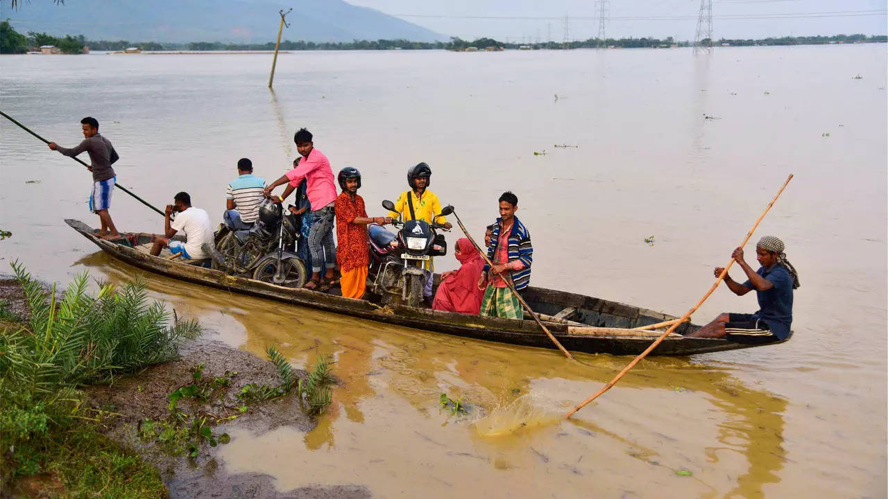 Assam Flood: Floods situation in Assam grim; landslide snaps road, rail ...