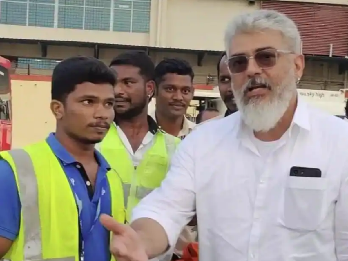 Ajiths Latest Photo In White Shirt With Airport Staff Goes Viral On