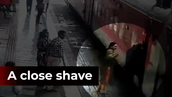 Caught on Cam: Miraculous escape for Surat woman who fell on the tracks ...