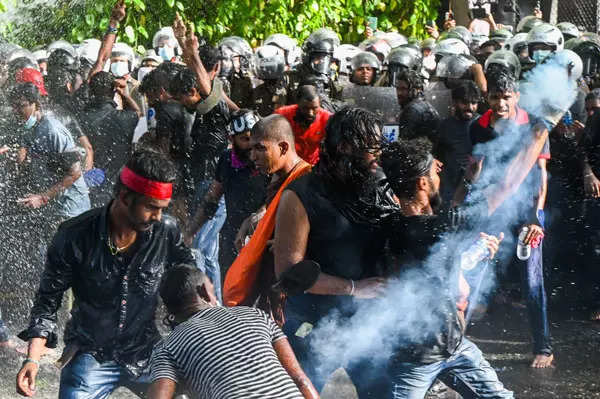 Clashes between police and protesters in Sri Lanka leave many injured; see pics